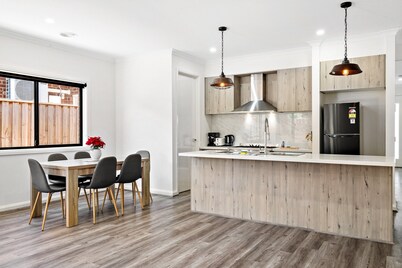 Spacious 4-Bed Home with Private Outdoor Area