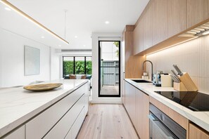 Fridge, microwave, oven, stovetop - Stylish 3-Bed Home Near South Melbourne Market (South Melbourne)