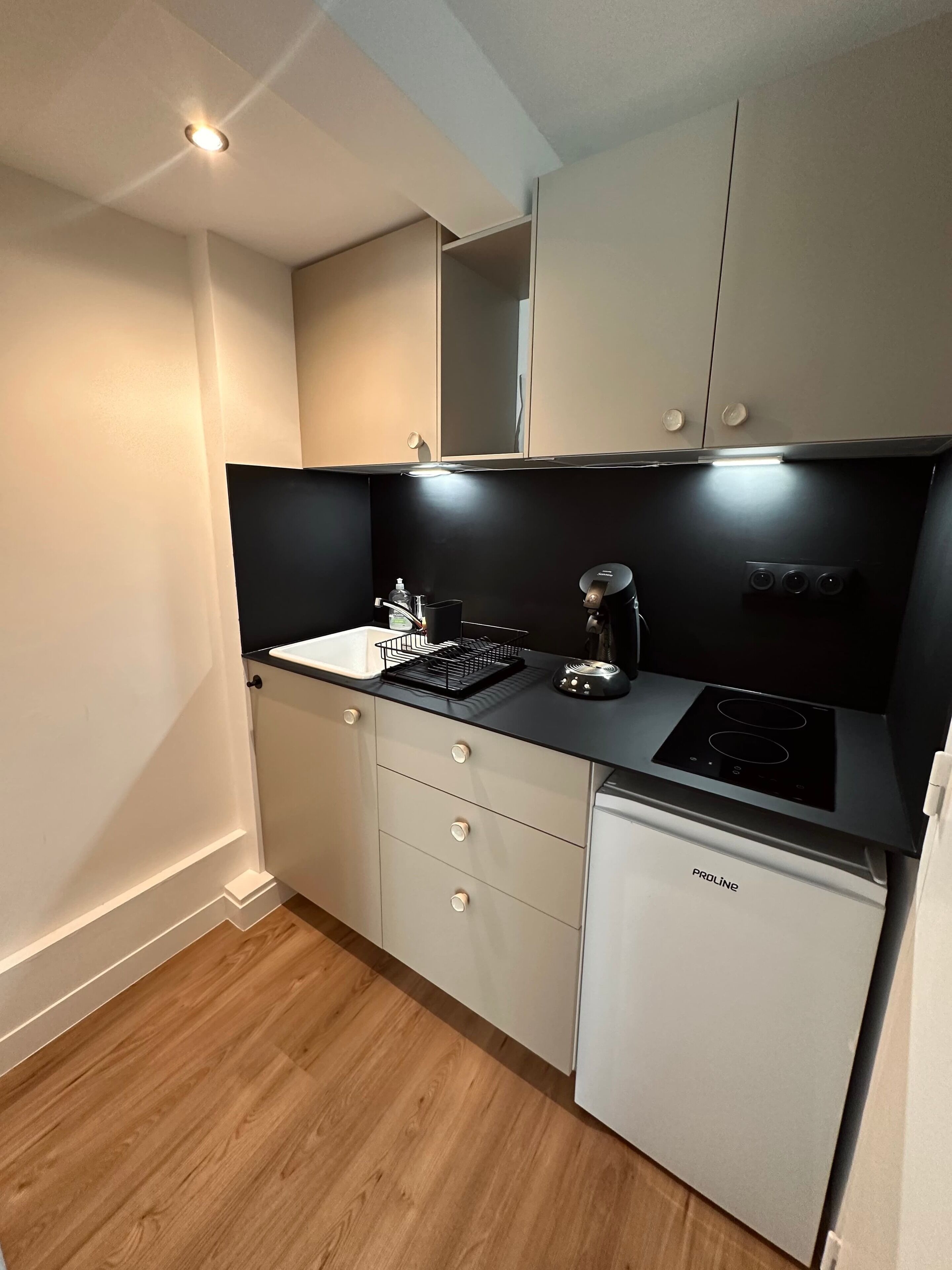 Fridge, microwave, coffee/tea maker, toaster