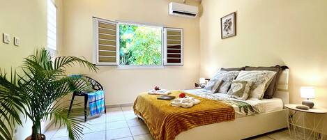 2 dormitorios, tabla de planchar con plancha, wifi gratis y ropa de cama