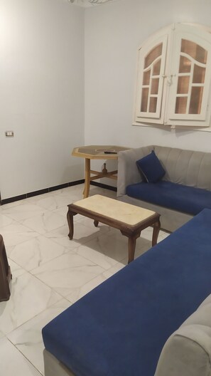 Living area - 3-bedroom apartment in the city centre of Beni Suef Governorate with AC (New Bani Suef)