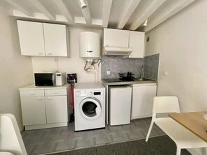 Fridge, microwave, toaster, cookware/dishes/utensils