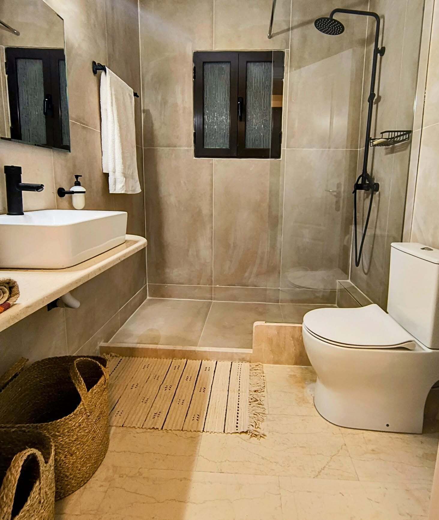 Shower, towels, soap, toilet paper