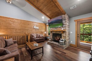 TV, fireplace - The Ultimate Staycation: Indoor Pool, Hot Tub & Game Room Cabin (Sevierville)
