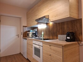 Basic Double Room, Courtyard View | Private kitchen | Fridge, microwave, oven, stovetop