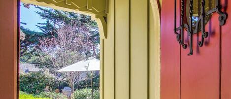 Pass Through the Garden and Enter Through the Arched Doorway