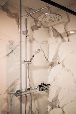 Shower, hair dryer, towels, soap