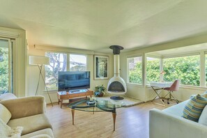 TV, fireplace, books