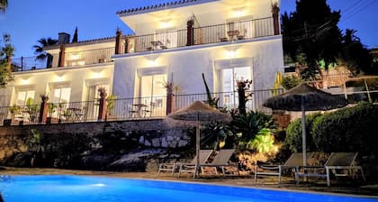 Boutique accommodation with pool and sea views. 24 guests!