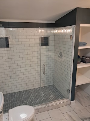 Shower, hair dryer, towels, soap