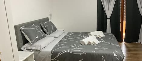 Blackout drapes, iron/ironing board, free WiFi