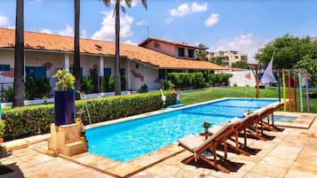 Outdoor pool, pool umbrellas, pool loungers