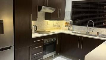 Apartamento, 2 quartos, para fumantes, piscina particular | Parte interna
