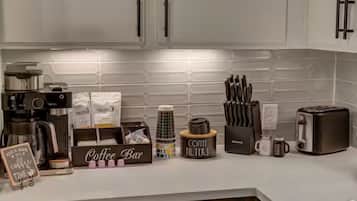 Coffee/tea maker, fridge, microwave, oven