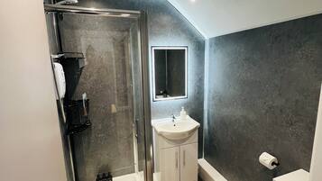 Hair dryer, towels, soap, toilet paper