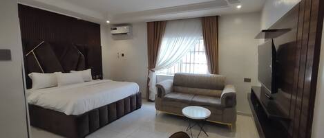 Family Room, Balcony, City View | Desk, laptop workspace, blackout curtains, soundproofing