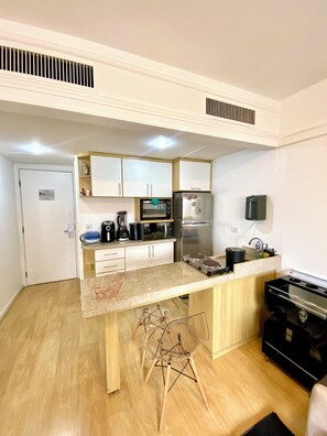 Private kitchen - Comfortable and fully equipped apartment in the heart of Jardins. (São Paulo)