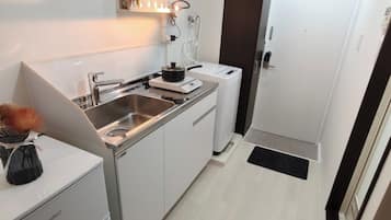 Fridge, microwave, cookware/dishes/utensils