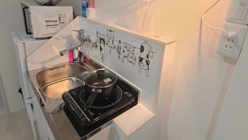 Fridge, microwave, cookware/dishes/utensils