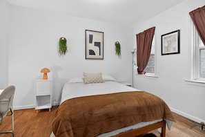 1 bedroom, desk, iron/ironing board, travel cot