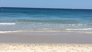 A beach with clear blue water and a sandy shore. - A LITTLE PIECE OF HEAVEN
Beachfront
1480 S Ocean Blvd,
Lauderdale By the Sea, FL (Pompano Beach)