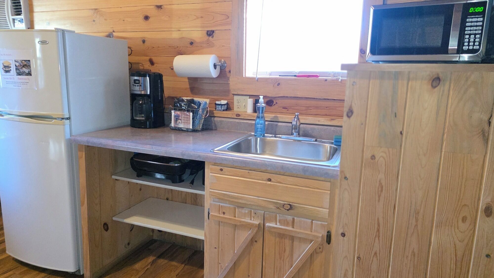 Fridge, microwave, coffee/tea maker, toaster