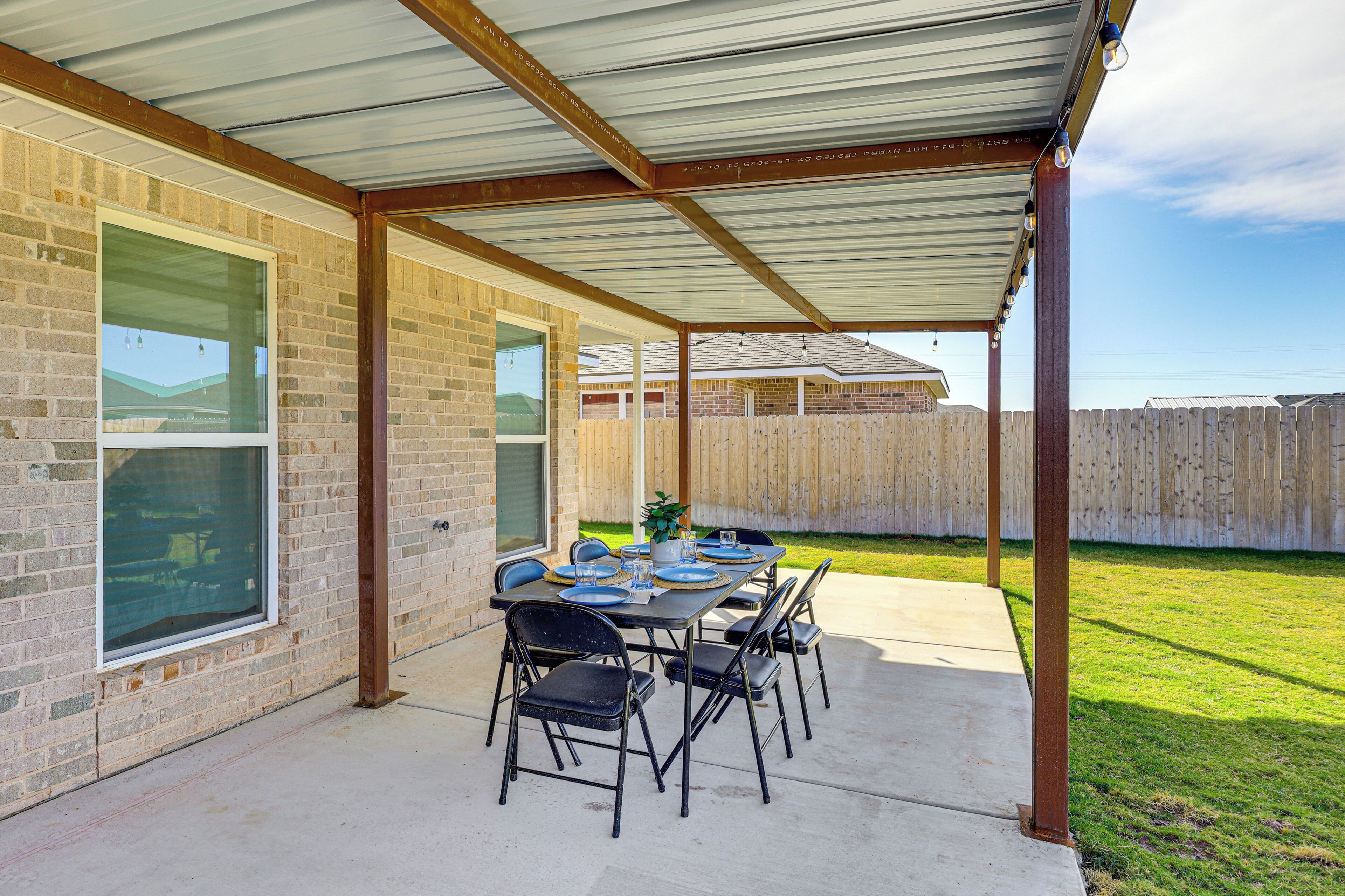 Covered Patio | Grill | Dining Space | Fenced Backyard