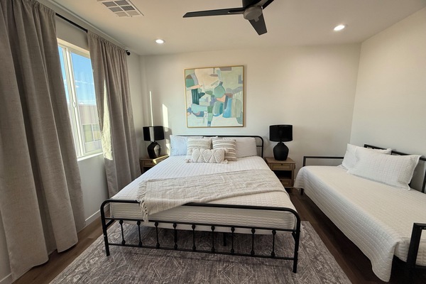Master bedroom with king bed and twin daybed