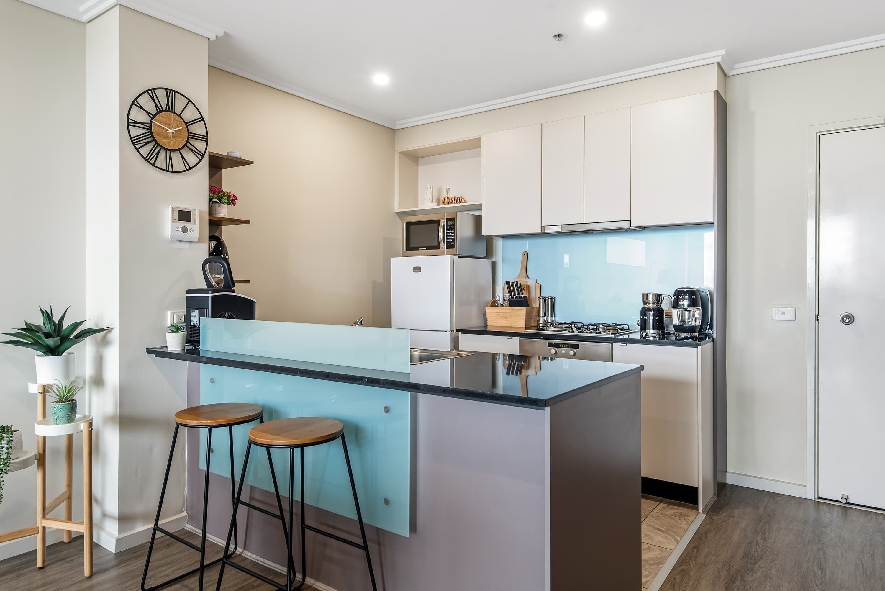 Coffee/tea maker, fridge, microwave, oven