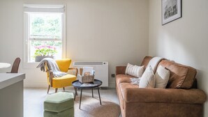Deluxe Apartment, Balcony, City View | Living area - Garden apartment with balcony (Bath)