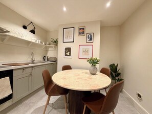 Deluxe Apartment, Balcony, City View | Living area - Garden apartment with balcony (Bath)