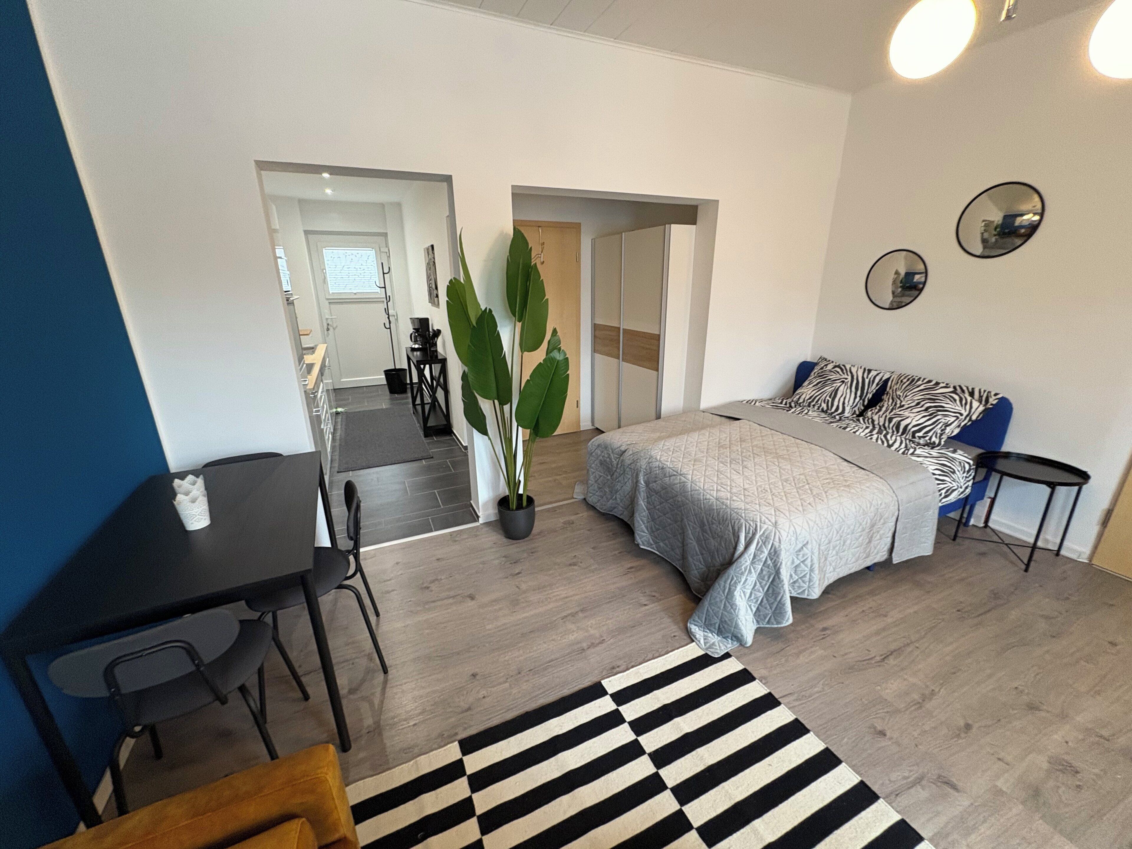 1 habitación, tabla de planchar con plancha, wifi y ropa de cama 