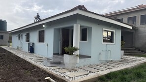 Exterior - Spacious, bright, inviting 2‑bed home in a secure, affluent neighbourhood. (Harare)