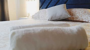 Tabla de planchar con plancha, Internet, ropa de cama