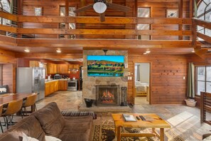 Smart TV, fireplace, books