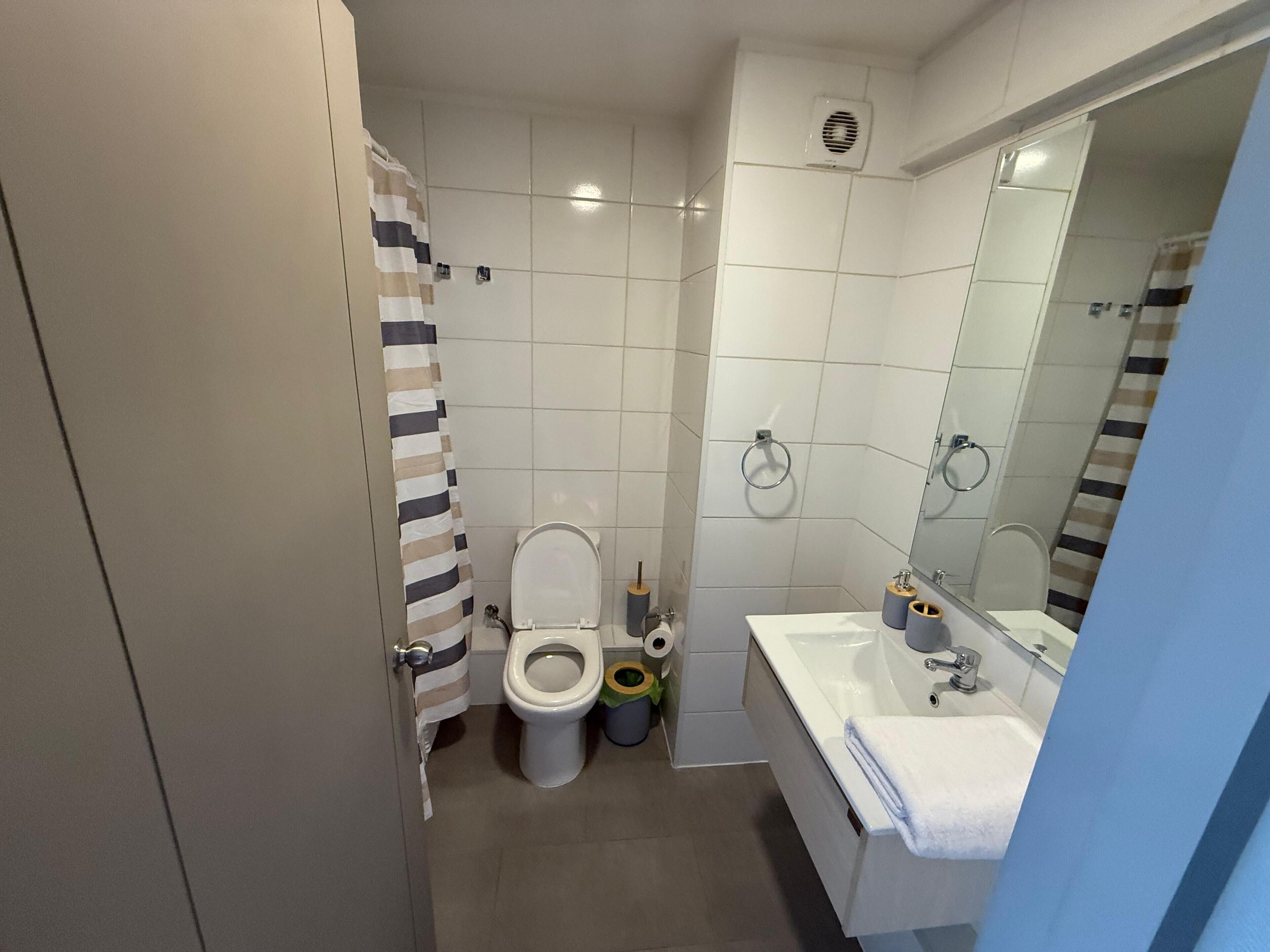 Hair dryer, towels, soap, toilet paper