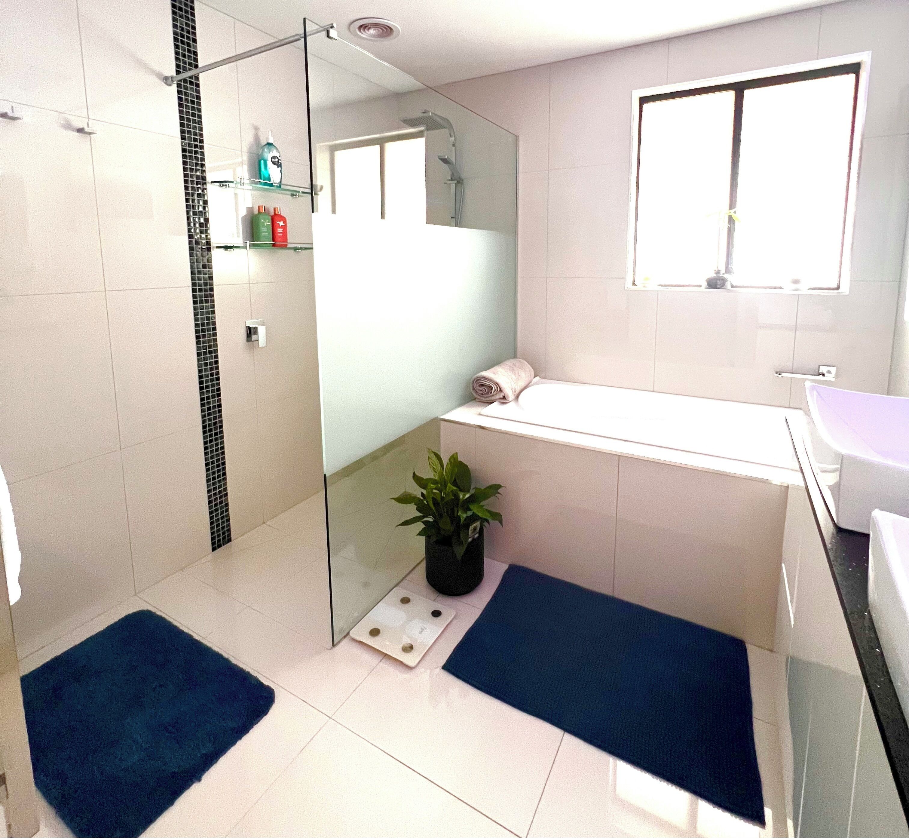 Shower, hair dryer, towels, soap