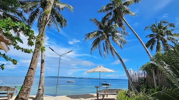 On the beach, white sand