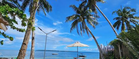 On the beach, white sand