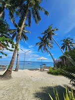 On the beach, white sand