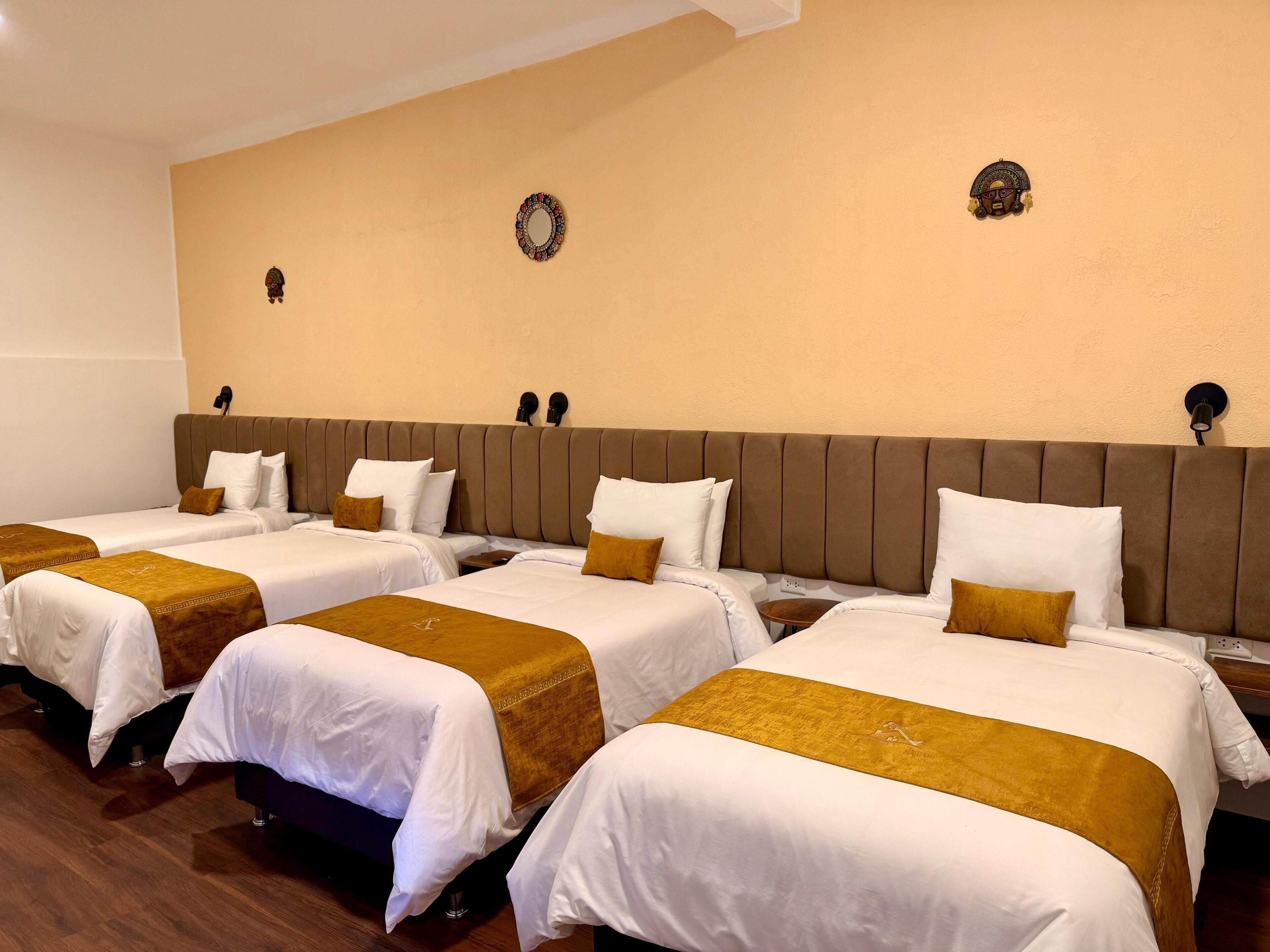 Standard Quadruple Room | Hypo-allergenic bedding, in-room safe, blackout curtains, soundproofing