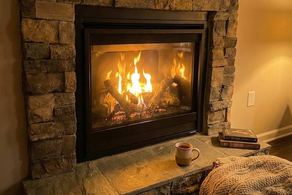 Cozy gas fireplace and a hot cup — perfect after a day on the trails