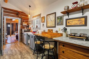 Fridge, microwave, coffee/tea maker, toaster