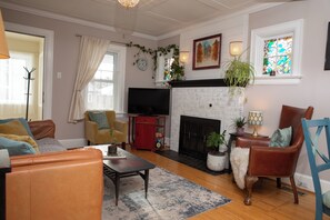 Smart TV, fireplace, books