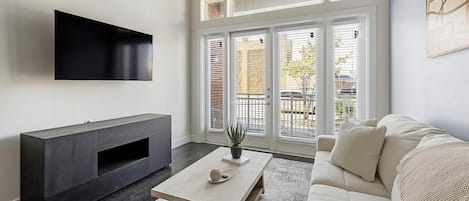 Apartment (1 Bedroom) | Living area | 50-inch TV with digital channels