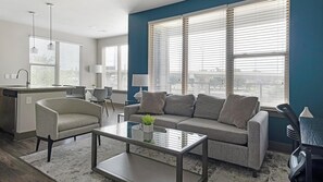 Apartment (2 Bedrooms) | Living area | 50-inch TV with digital channels - Landing Apartments Near Eldridge/West Oaks (Houston)