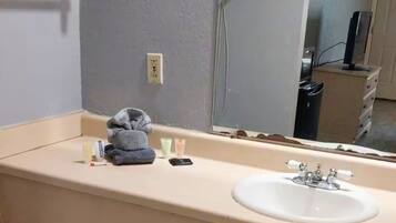 Hair dryer, towels, soap, toilet paper