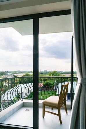 Quadruple Room, Balcony | Desk, free WiFi, bed sheets - Nhu Y Hotel Tay Ninh (Tay Ninh)