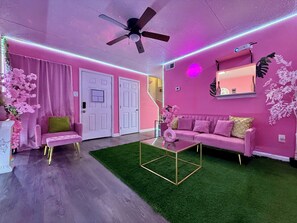 Living area - Pink Palace Cinema Oasis•Cozy Extravaganza•Beach (Gulfport)