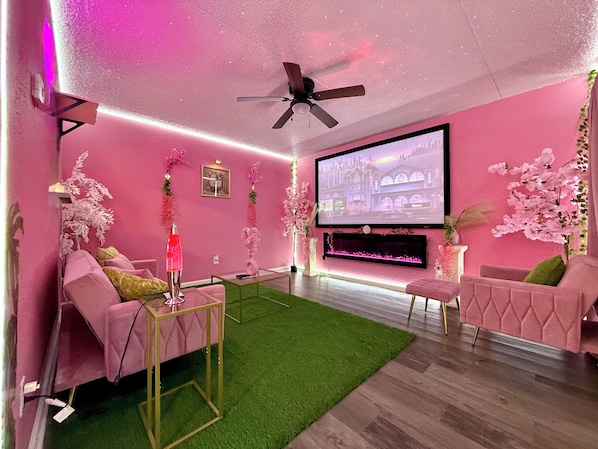 Living area - Pink Palace Cinema Oasis•Cozy Extravaganza•Beach (Gulfport)